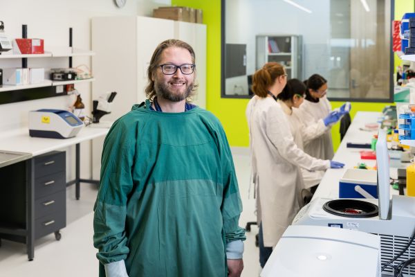 Niall Corcoran in lab coat