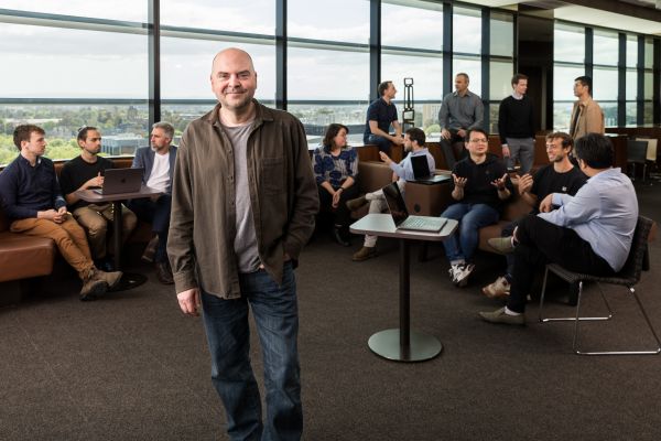Group of people sitting in event space
