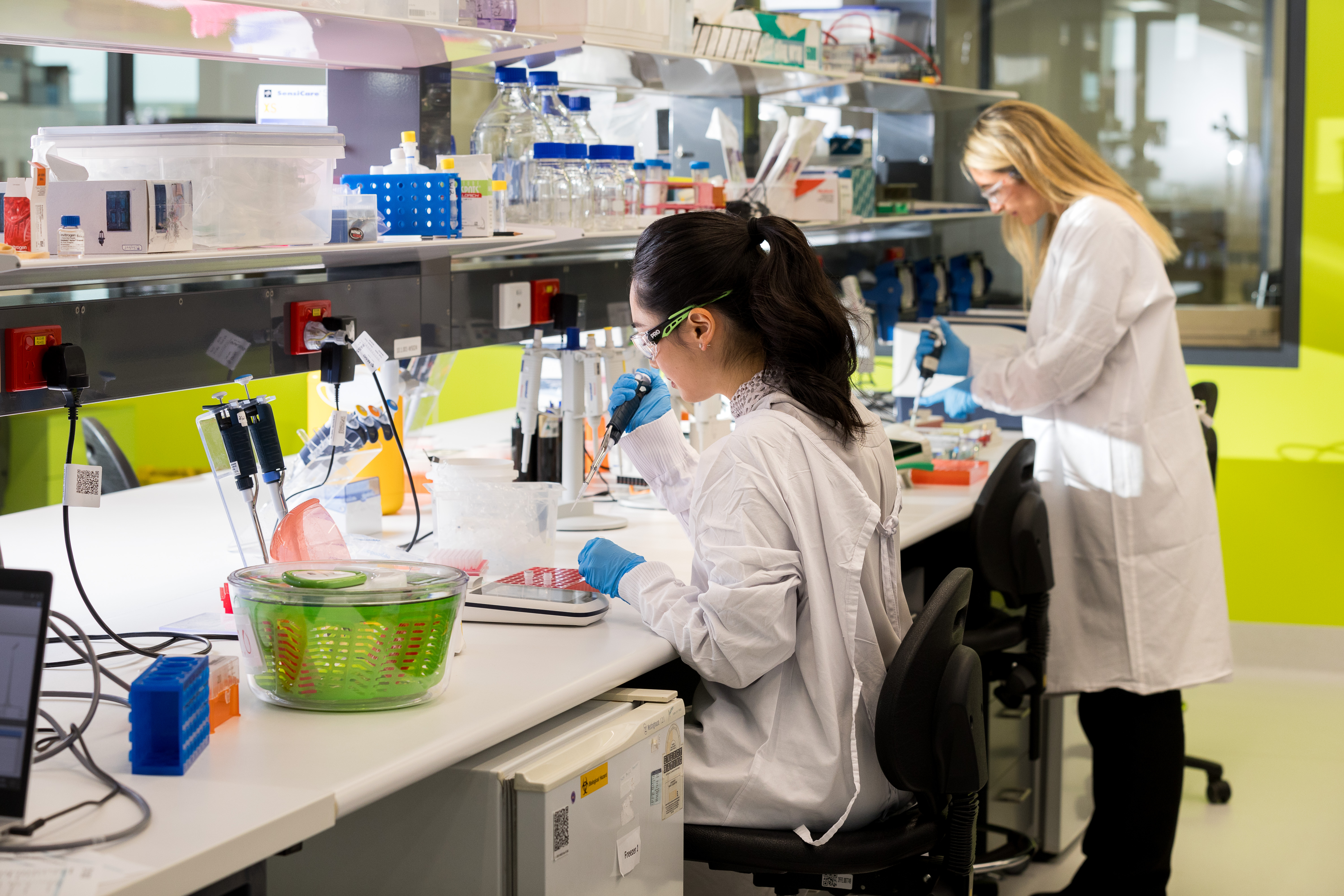 Two women working in lab