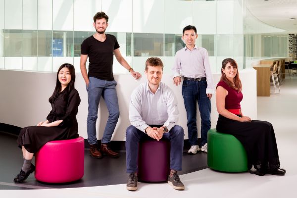 Group of people standing in foyer